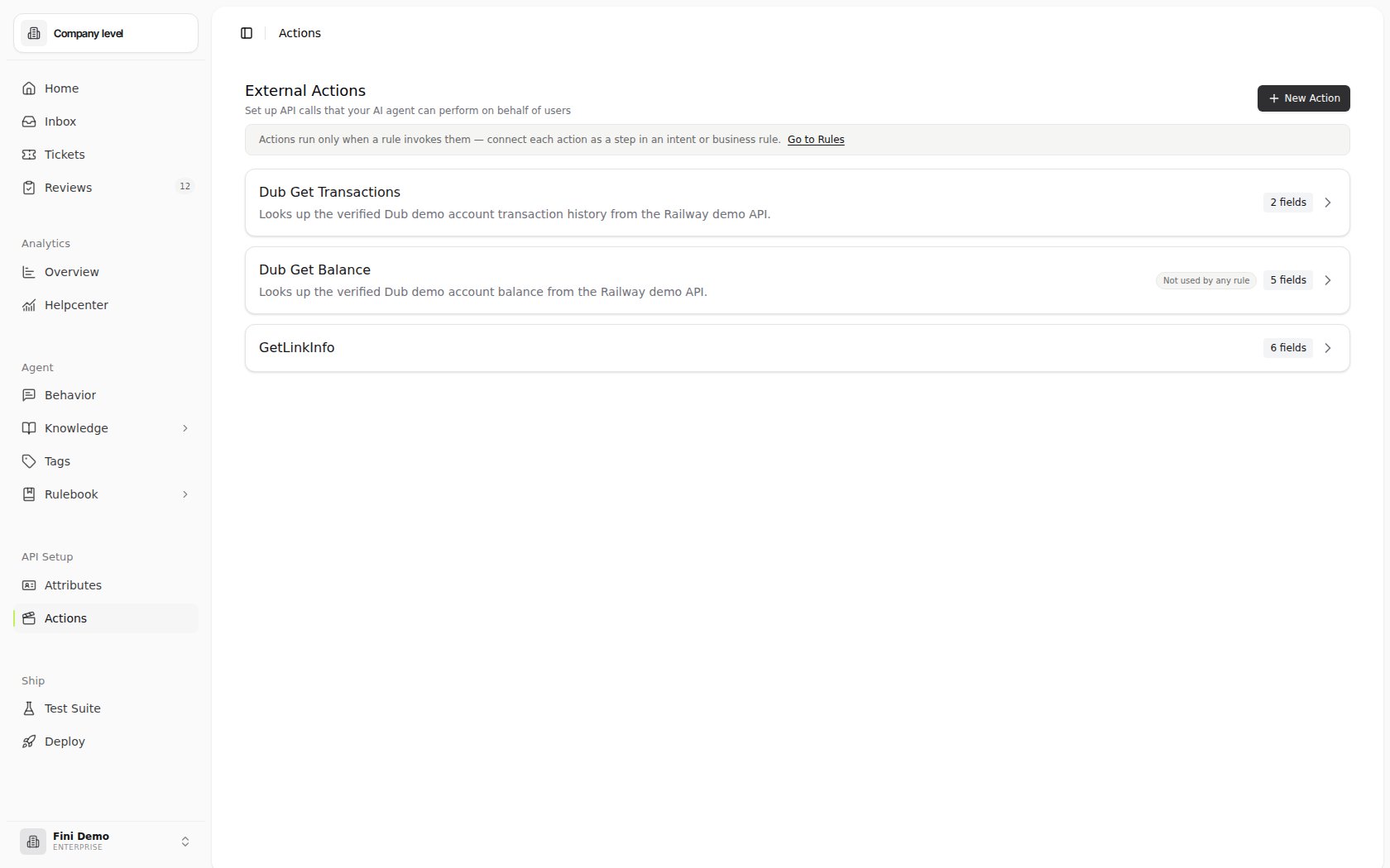 External Actions page in the Fini Demo workspace showing GetTransactions and GetBalance actions, field counts, the New Action button, and an inline notice linking to Rules
