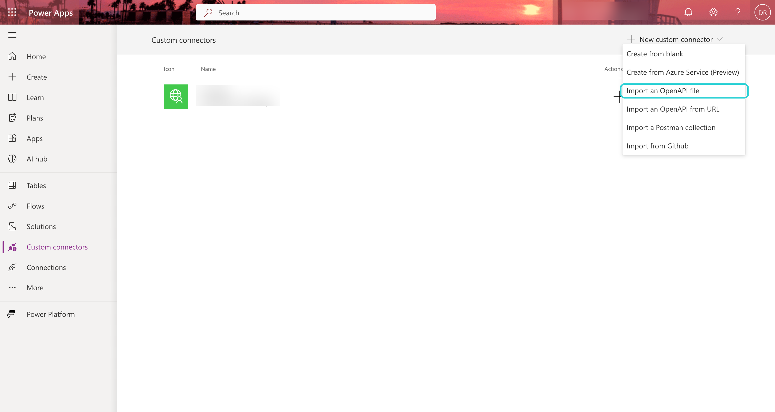 Power Apps Custom connectors page with the New custom connector menu open and Import an OpenAPI file highlighted