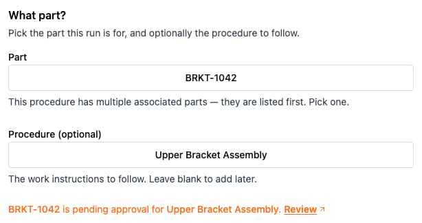 Run wizard Part step with a part and procedure selected, showing a message that the part is pending approval for the procedure alongside a Review link.