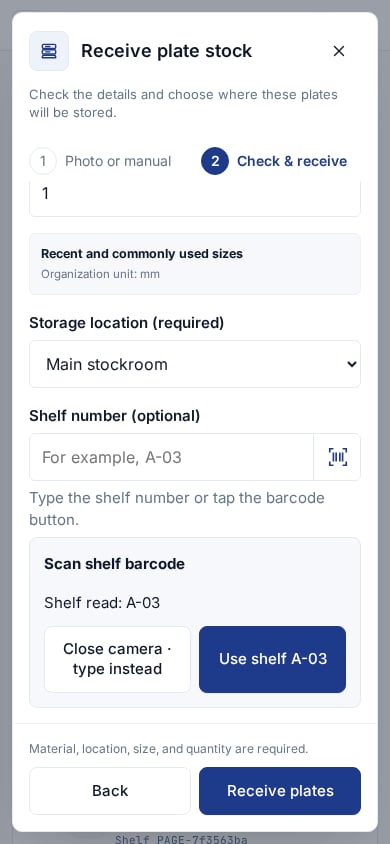 English mobile shelf scanner showing A-03 with the Use shelf A-03 confirmation button