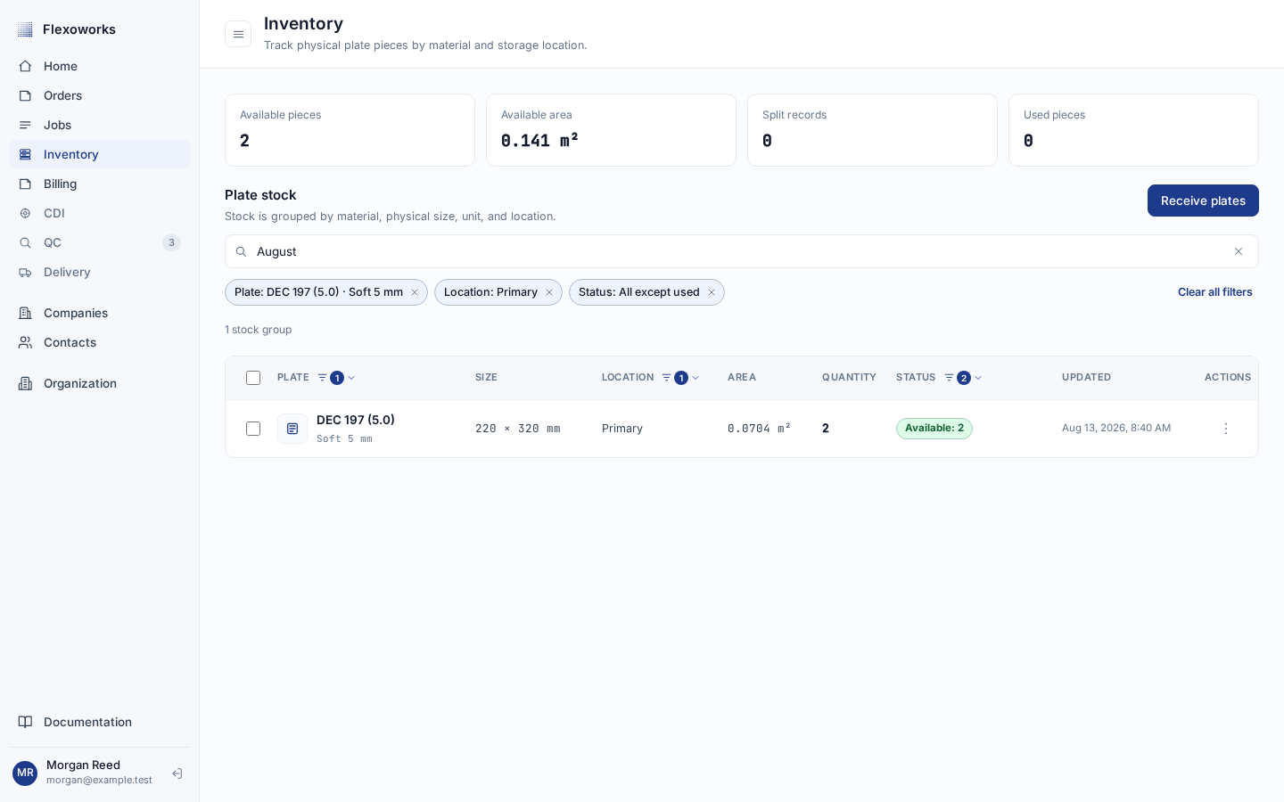 English Inventory with active material, location, and status filter pills, search, and one grouped result