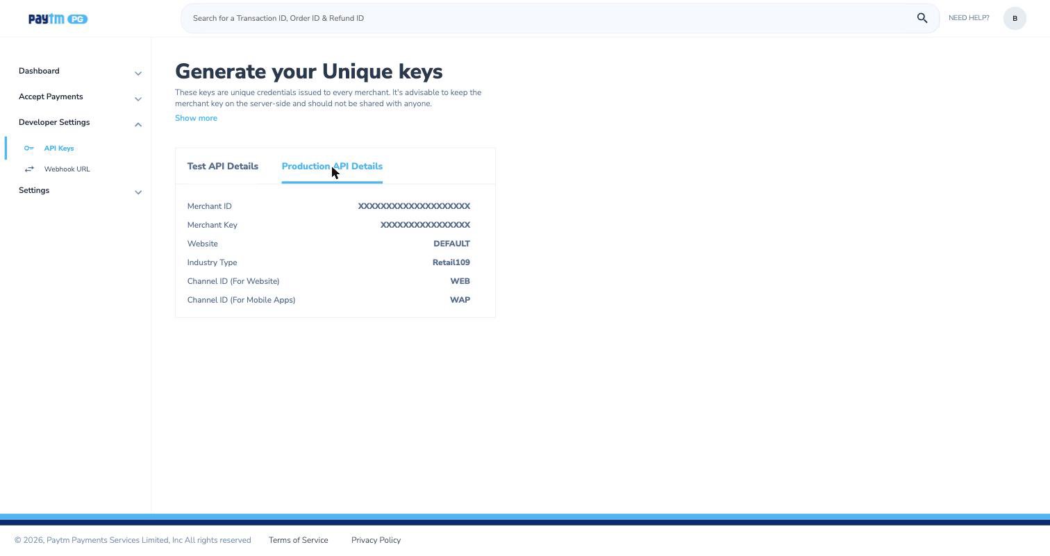 Paytm dashboard API Keys page with the Production API Details tab selected, showing Merchant ID and Merchant Key