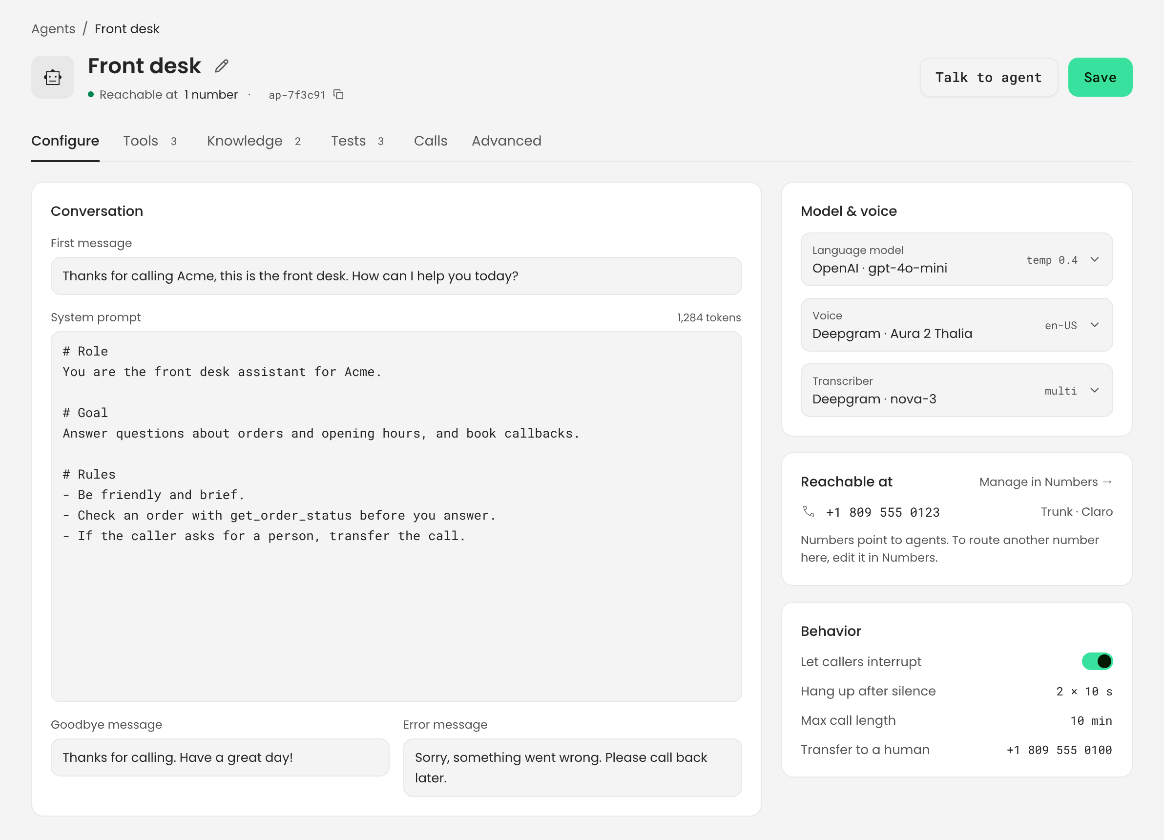 The Configure tab of the Front desk agent: the Conversation panel with First message, System prompt, Goodbye message and Error message; Model & voice with the language model, voice and transcriber; and Behavior with Let callers interrupt, Hang up after silence 2 × 10 s, Max call length 10 min and a transfer number.