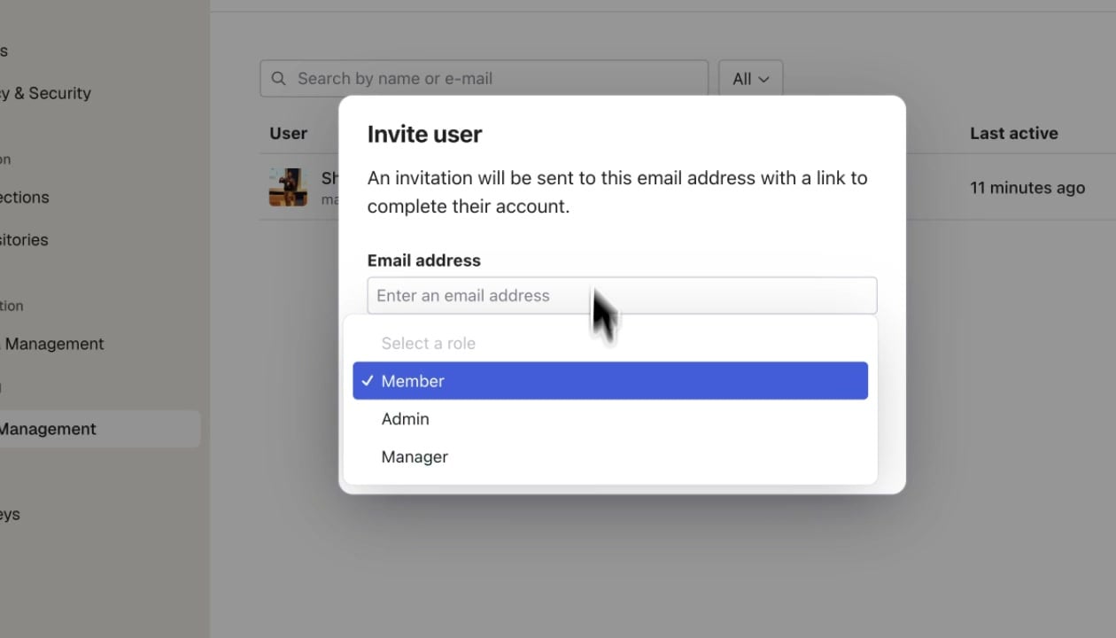 Invite user dialog showing email address field and role selector with Member, Admin, and Manager options
