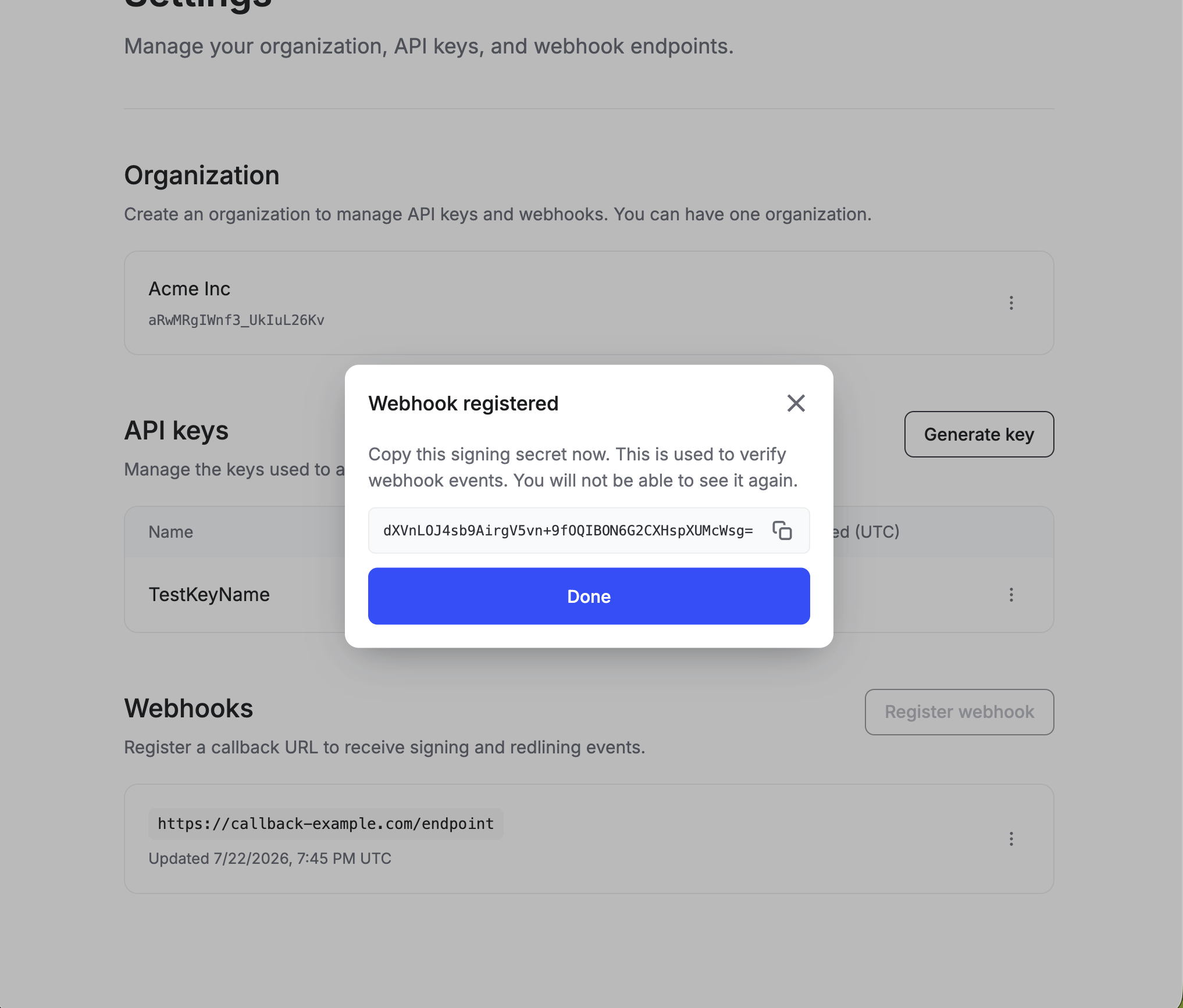 Webhook registered modal showing a signing secret with a copy button