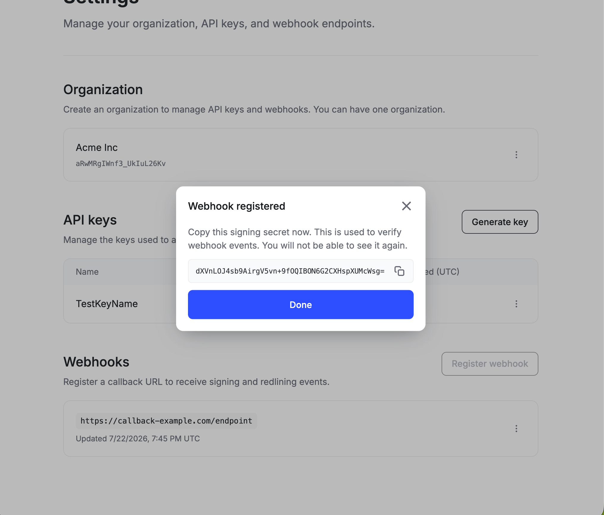 Webhook registered modal showing a signing secret with a copy button