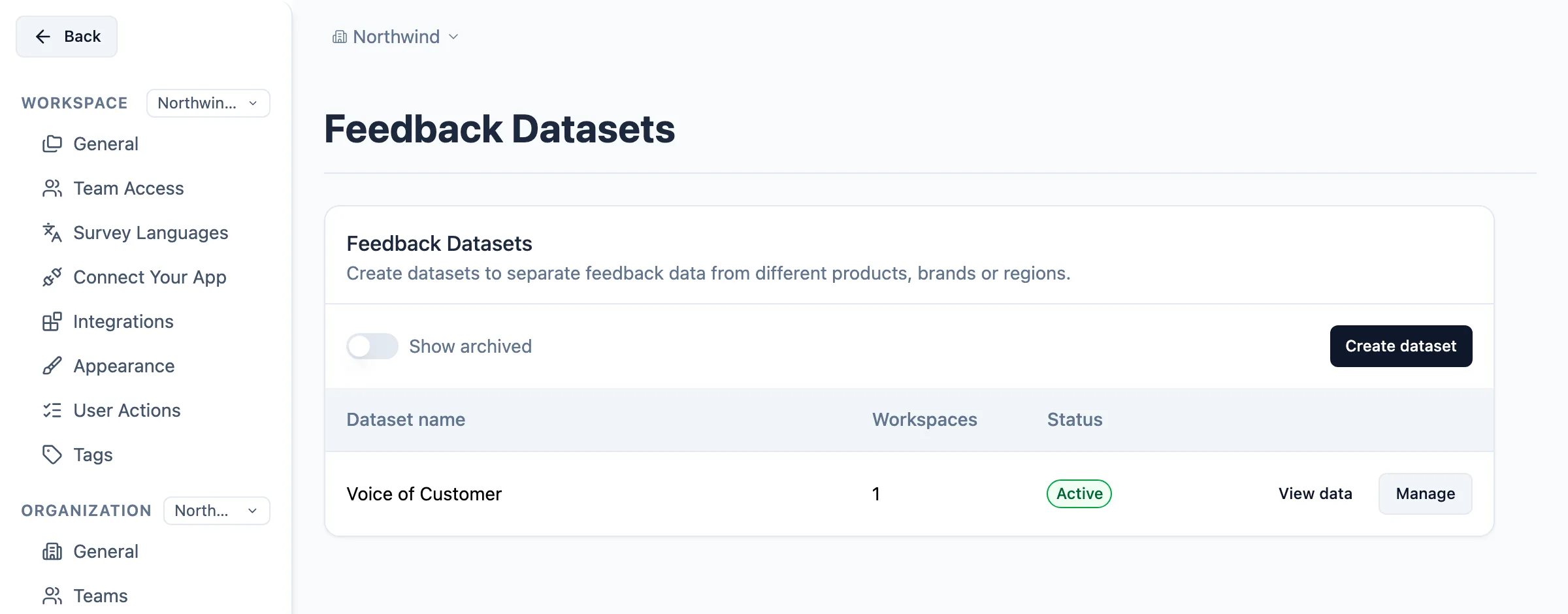 Feedback Datasets settings page listing the Voice of Customer dataset as active with one workspace