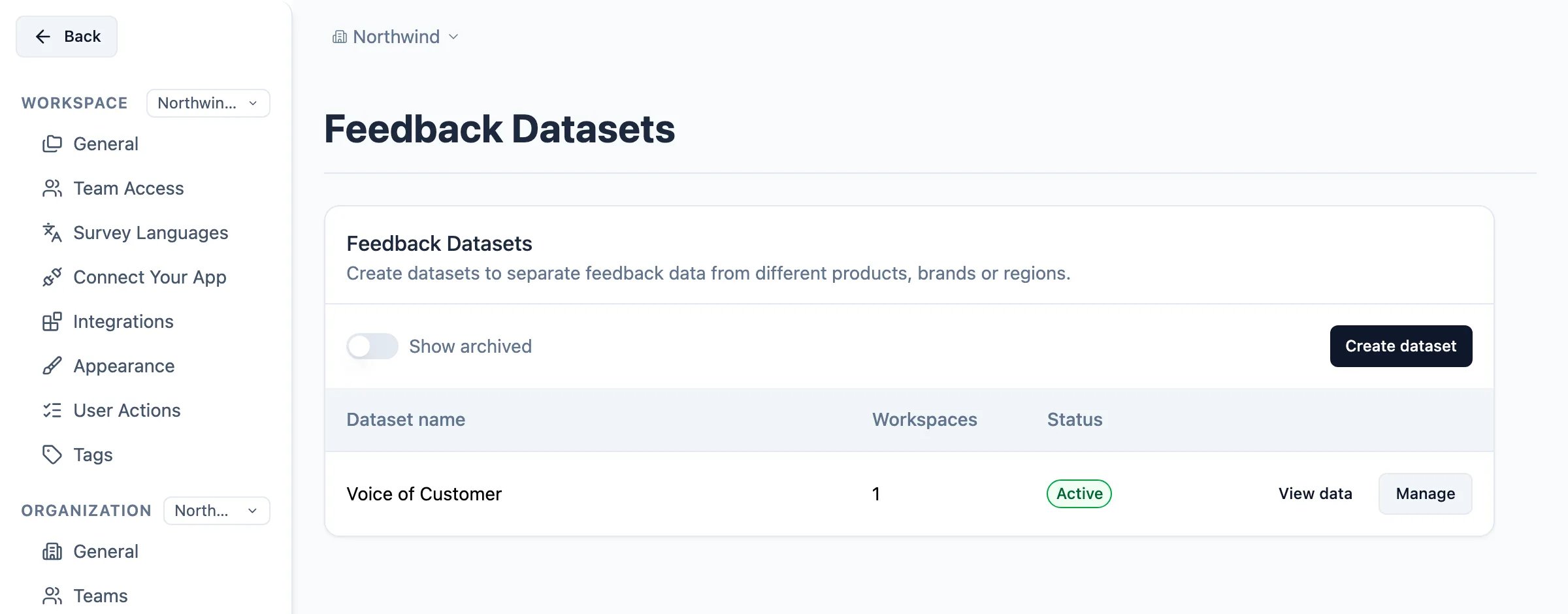 Feedback Datasets settings page listing the Voice of Customer dataset as active with one workspace