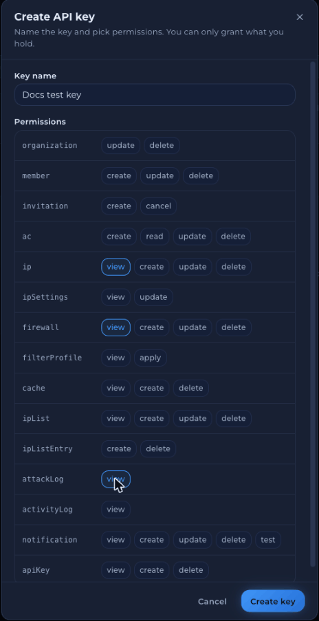 Create API key dialog with a Key name field and a grid of permission buttons grouped by resource, such as ip view, firewall view and create, and attackLog view