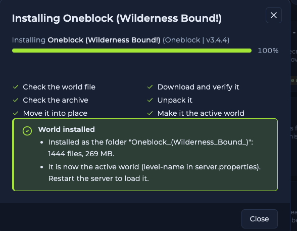 World installed message giving the folder name, number of files and size, and saying it is now the active world and the server must restart to load it