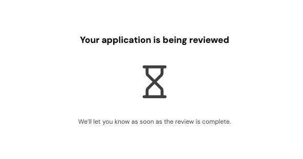 The end user sees a message that their application is being reviewed