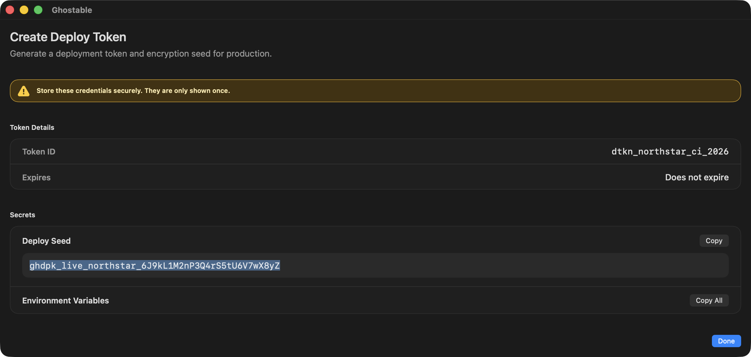 Ghostable desktop deploy token result window showing the one-time token secrets and the copyable CI environment-variable block.