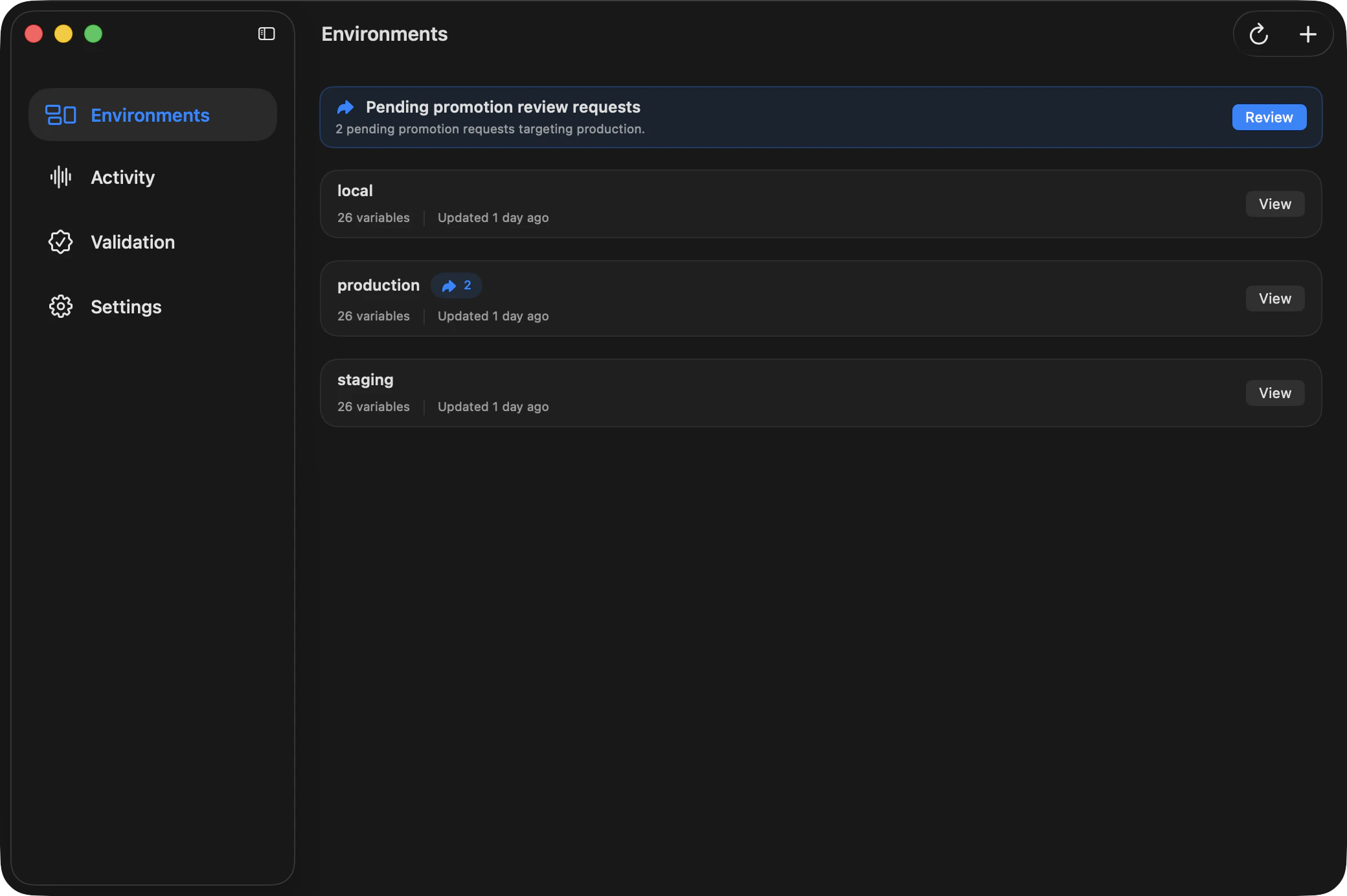 Ghostable desktop environments view in dark mode showing a pending promotion review banner and pending indicators on environment cards.