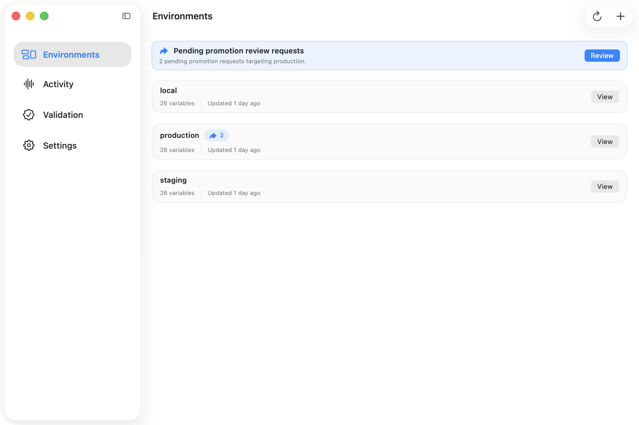 Ghostable desktop environments view in light mode showing a pending promotion review banner and pending indicators on environment cards.