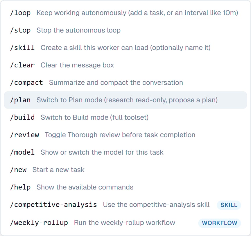 The slash command menu listing the built-in commands plus a saved skill and workflow