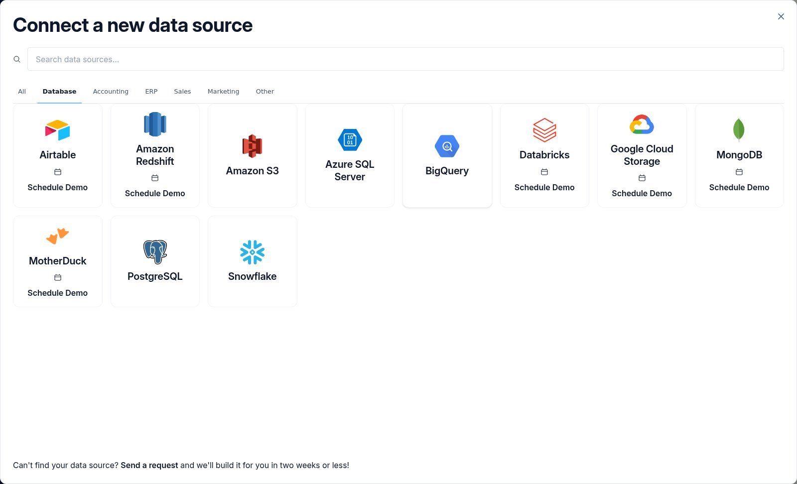 The Connect a new data source modal on the Database tab with the BigQuery connector tile highlighted.