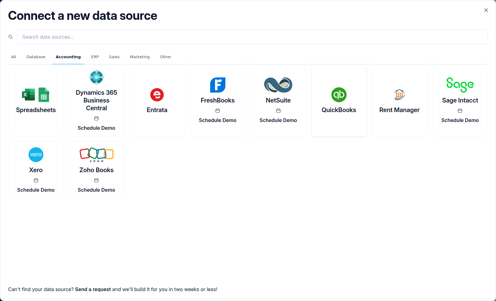 The Connect a new data source modal on the Accounting tab with the QuickBooks connector tile highlighted.