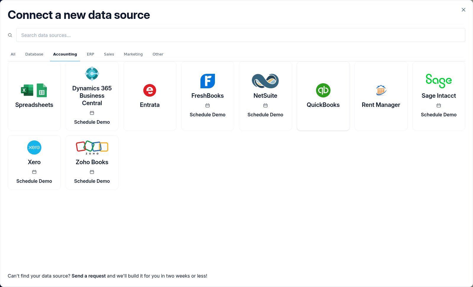 The Connect a new data source modal on the Accounting tab with the QuickBooks connector tile highlighted.