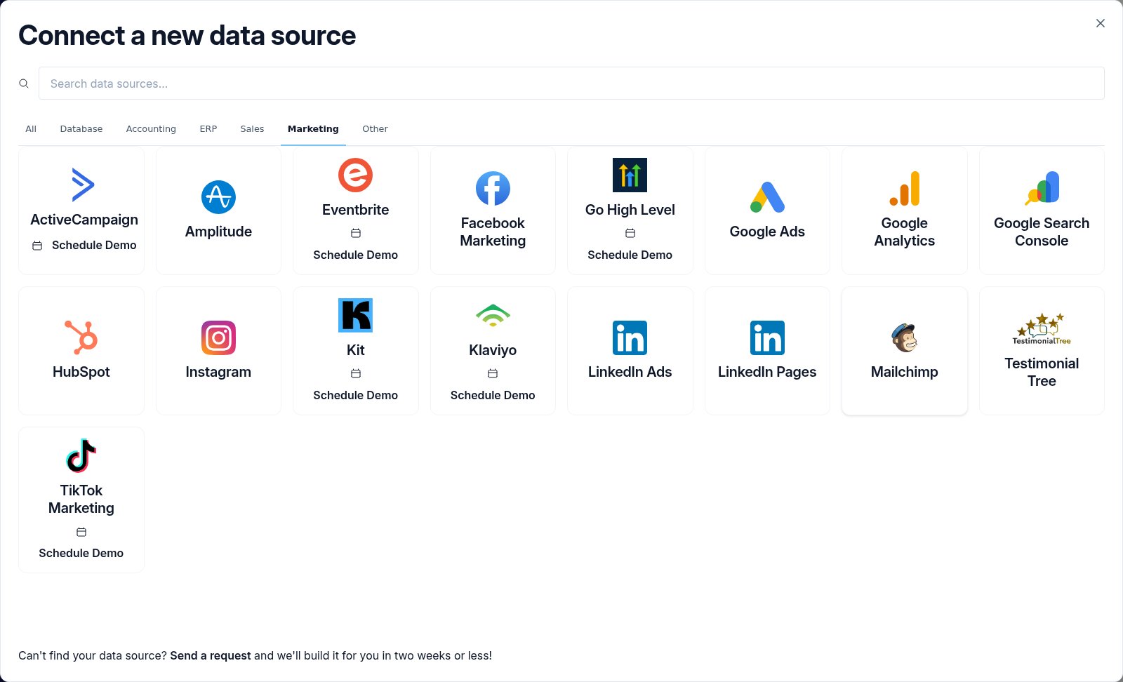 The Connect a new data source modal on the Marketing tab showing the grid of available sync connectors.