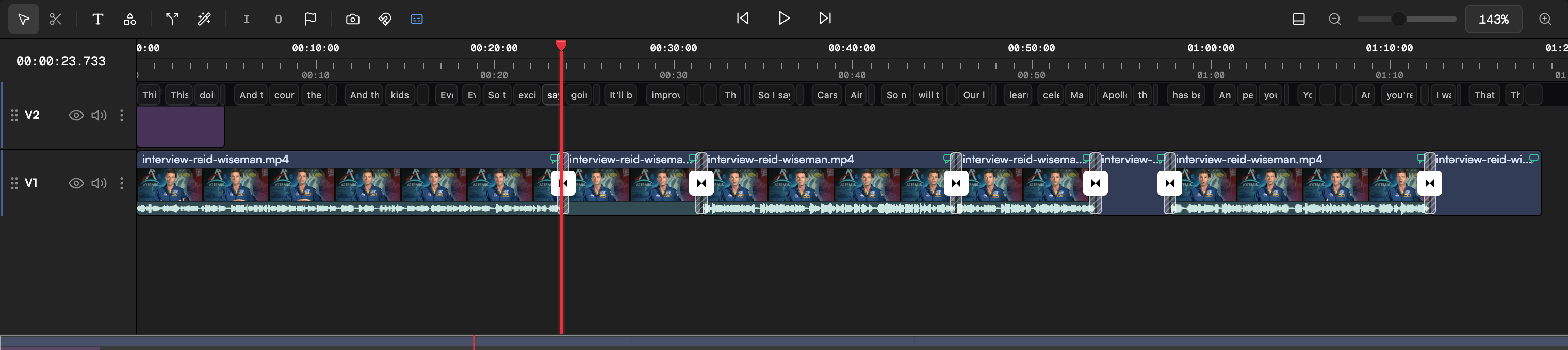 A transition being dragged from the panel onto the cut between two clips, with the cut highlighted as a valid drop target