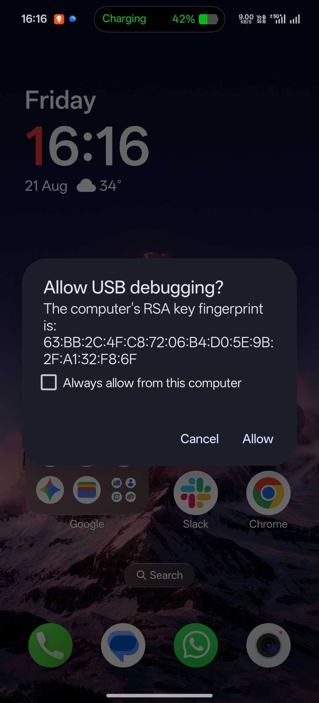 Allow USB debugging prompt on the phone showing the computer's RSA key fingerprint