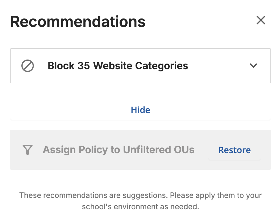 Recommendations list with Show Dismissed selected, showing the dismissed Assign Policy to Unfiltered OUs recommendation grayed out with a Restore button