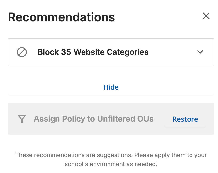 Recommendations list with Show Dismissed selected, showing the dismissed Assign Policy to Unfiltered OUs recommendation grayed out with a Restore button