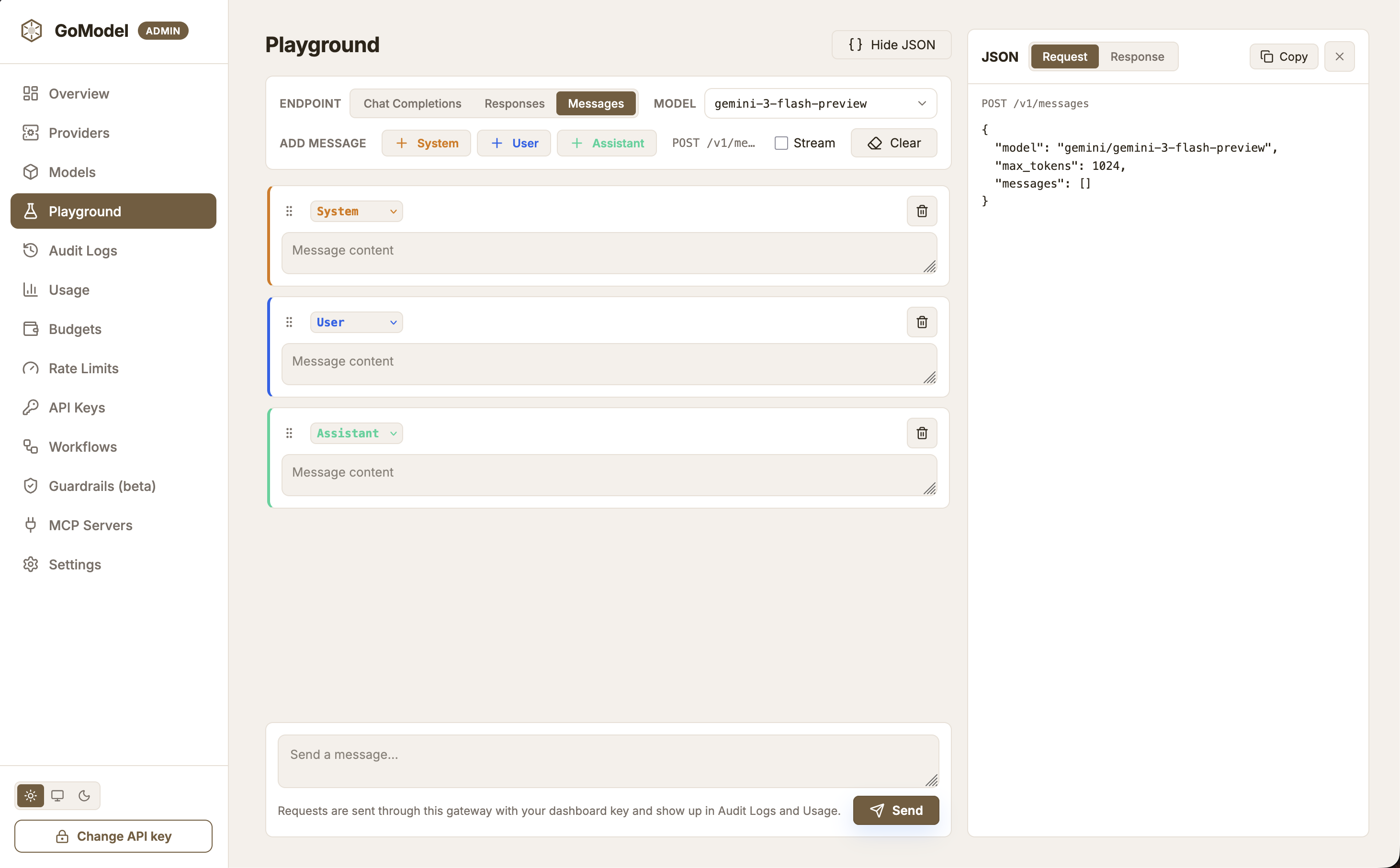GoModel dashboard Playground page with the Messages endpoint selected, a model picker, System, User, and Assistant message cards, a prompt composer, and the request JSON panel on the right
