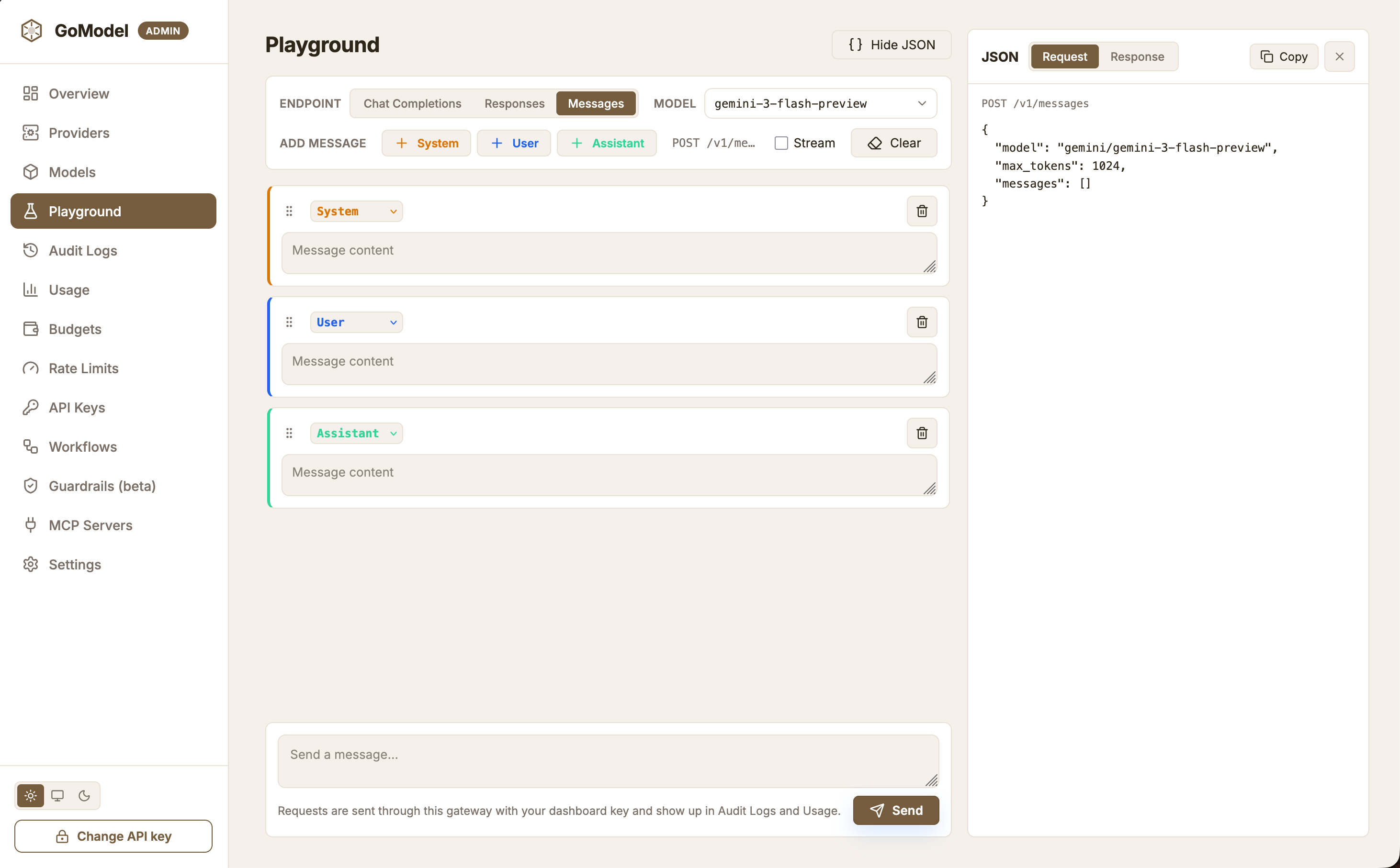 GoModel dashboard Playground page with the Messages endpoint selected, a model picker, System, User, and Assistant message cards, a prompt composer, and the request JSON panel on the right