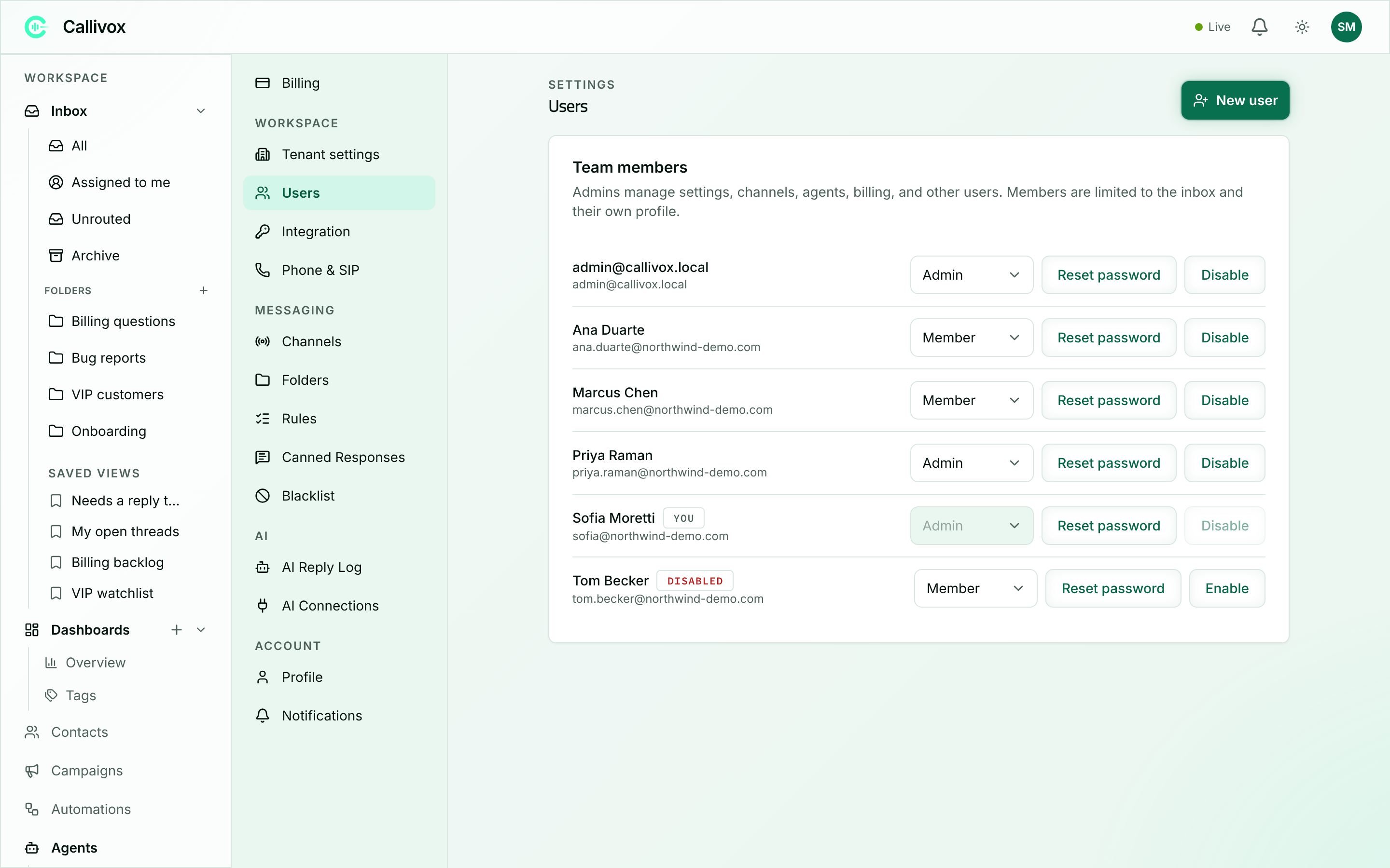The Users settings page listing team members with role dropdowns and Reset password and Disable buttons