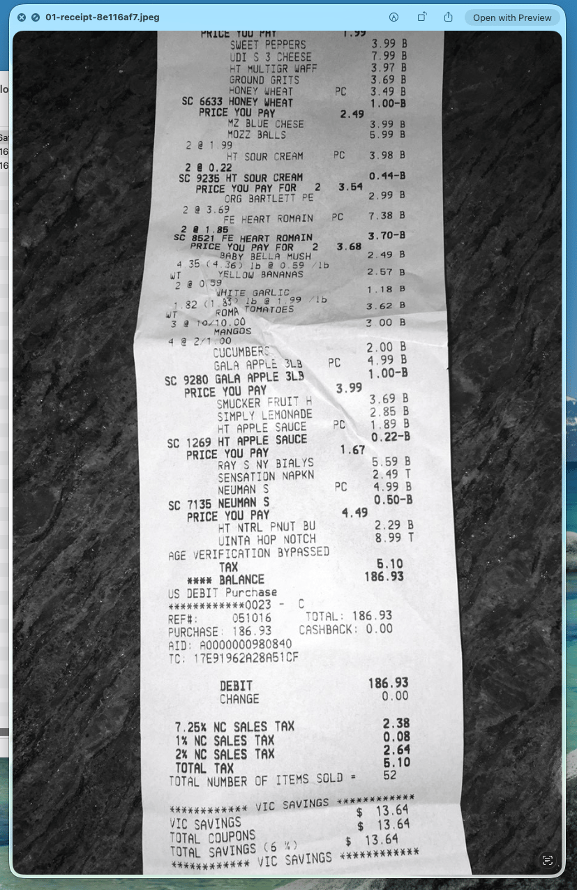 A receipt opened from Finder while HoloDesktop CLI reads the visible total