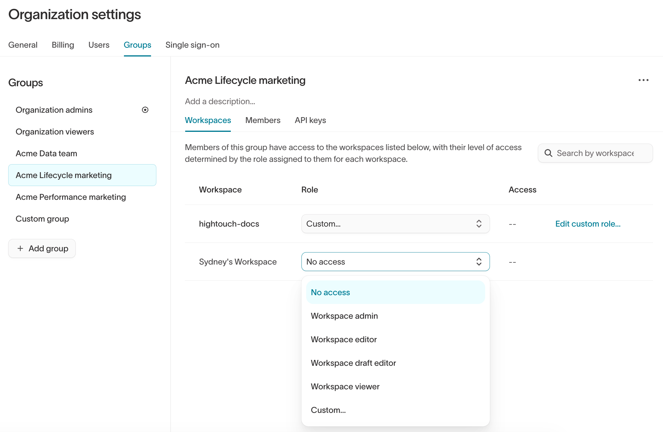 The Workspaces tab of a group in Organization settings, with the Role dropdown open