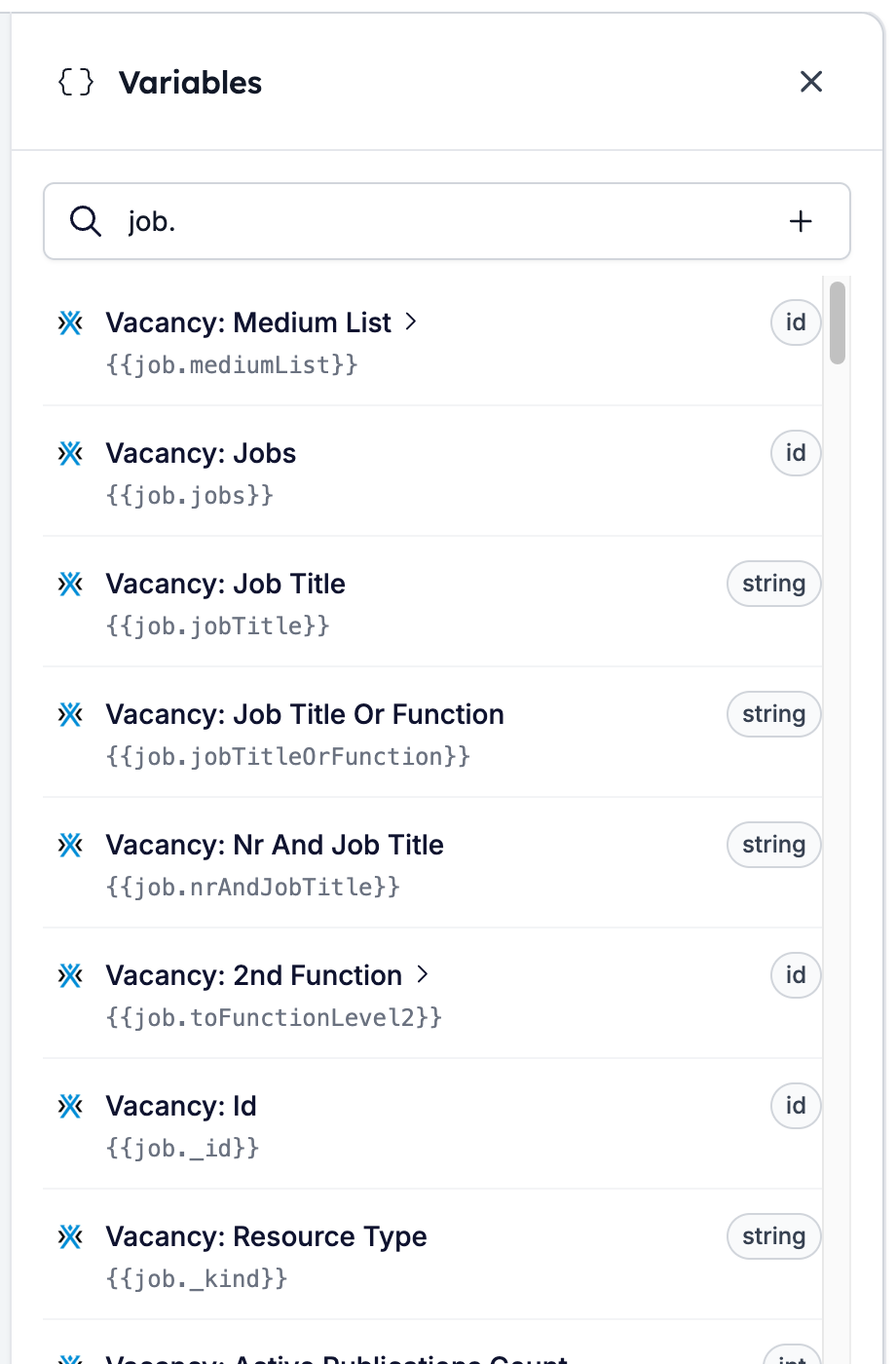 The Variables drawer filtered to the job key, listing Vacancy: Job Title and the other fields of the linked vacancy with their variable names