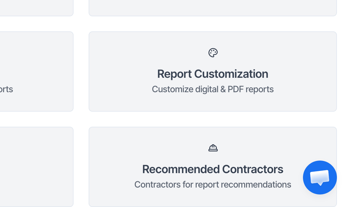 The bottom right corner of a dashboard page, with the round blue chat bubble over the page content