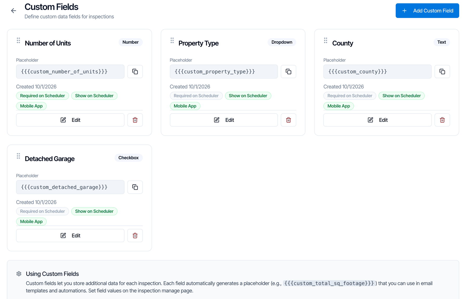 The Custom Fields page with an Add Custom Field button and four field cards: Number of Units (Number), Property Type (Dropdown), County (Text) and Detached Garage (Checkbox). Each card shows its placeholder, such as {{{custom_number_of_units}}}, badges for Required on Scheduler, Show on Scheduler and Mobile App, and Edit and delete buttons