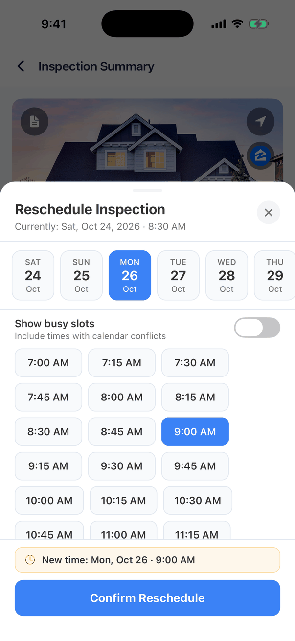 The Reschedule Inspection sheet: Currently Sat, Oct 24, 2026 · 8:30 AM, a row of dates from Sat 24 Oct to Thu 29 Oct with Mon 26 selected, a Show busy slots switch (Include times with calendar conflicts) turned off, a grid of times from 7:00 AM to 11:15 AM with 9:00 AM selected, the note New time: Mon, Oct 26 · 9:00 AM and a Confirm Reschedule button