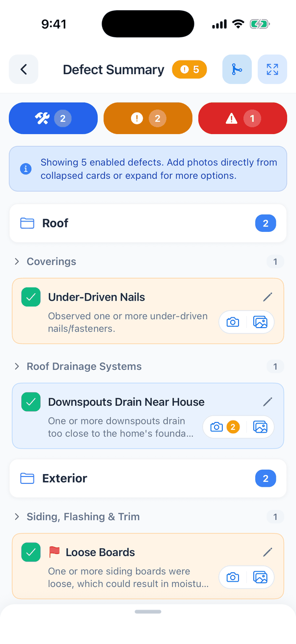 The Defect Summary screen with an orange badge 5, a merge button and an expand button. Three filter buttons: blue (2), orange (2) and red (1). A note: Showing 5 enabled defects. Add photos directly from collapsed cards or expand for more options. Then Roof (2) with Coverings: Under-Driven Nails, and Roof Drainage Systems: Downspouts Drain Near House with 2 photos; and Exterior (2) with Siding, Flashing & Trim: Loose Boards with a red flag