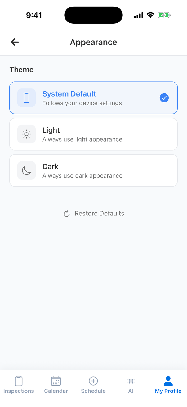 Appearance settings: Theme with System Default (Follows your device settings, selected), Light (Always use light appearance) and Dark (Always use dark appearance), and Restore Defaults