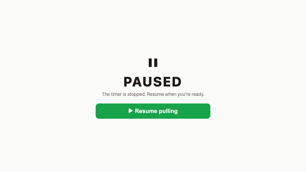 The full-screen Paused state covering the pull, with a green Resume pulling button