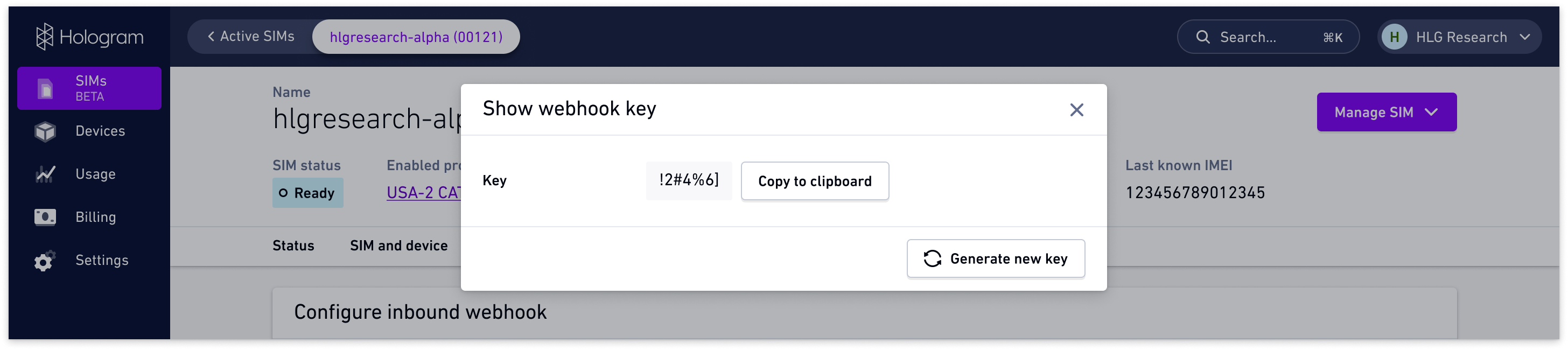 Modal displaying the webhook key with options to copy or generate a new key