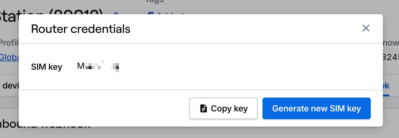 Modal displaying the webhook key with options to copy or generate a new key