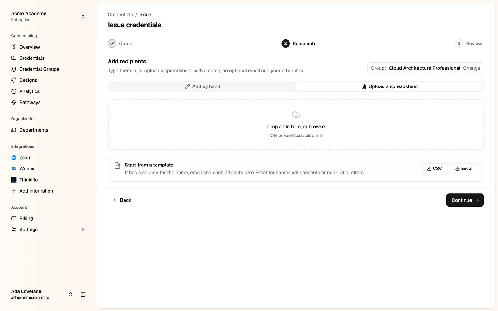 The Upload a spreadsheet tab with the file drop area and template downloads