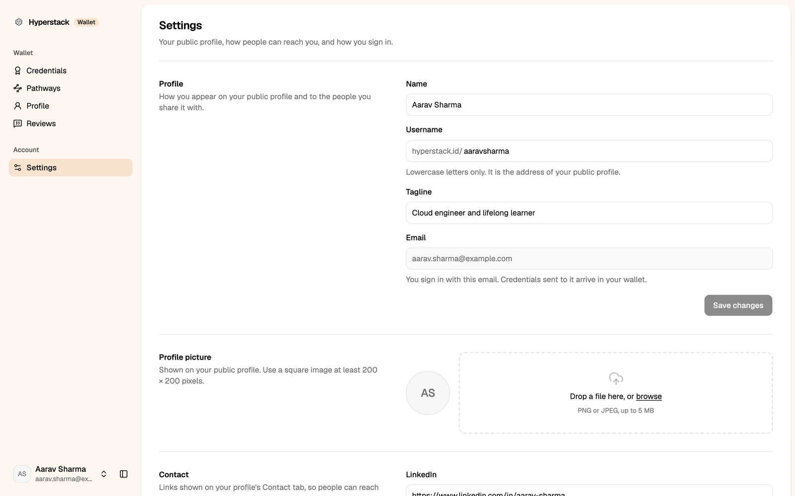 Wallet settings with name, username, tagline and email