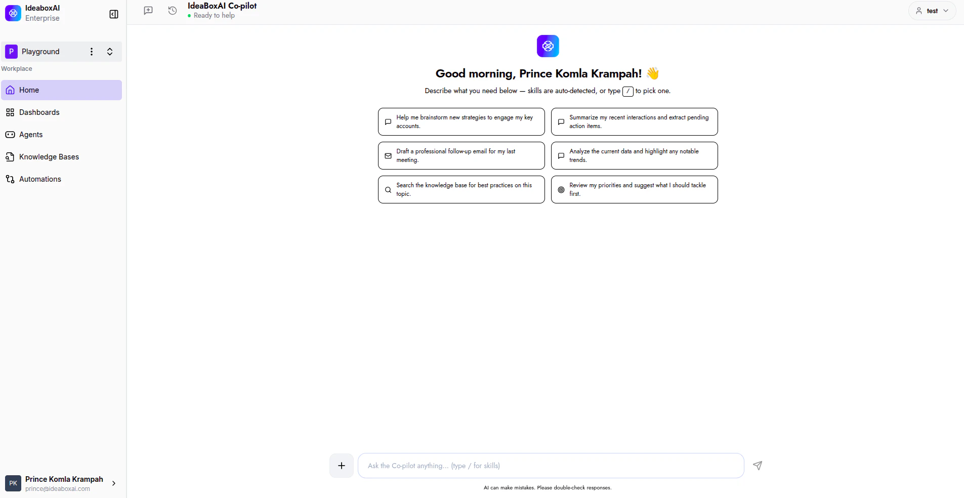 Conversational AI home screen showing the personalised greeting, skill cards in a 2-column grid, and chat input bar.