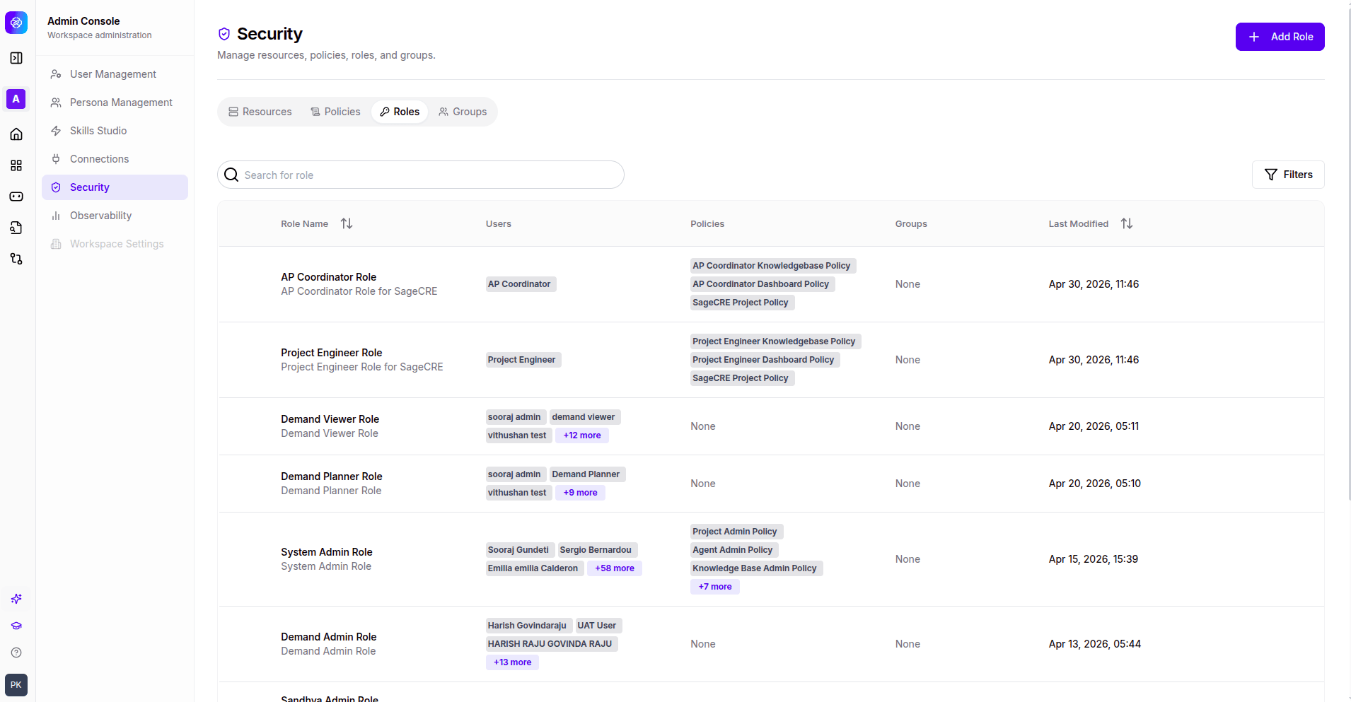 Security Roles tab showing default roles with user pills, policy counts, and group counts.