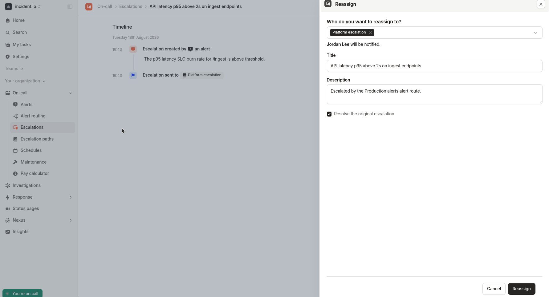 The Reassign drawer with a target selected and a preview of who will be
paged