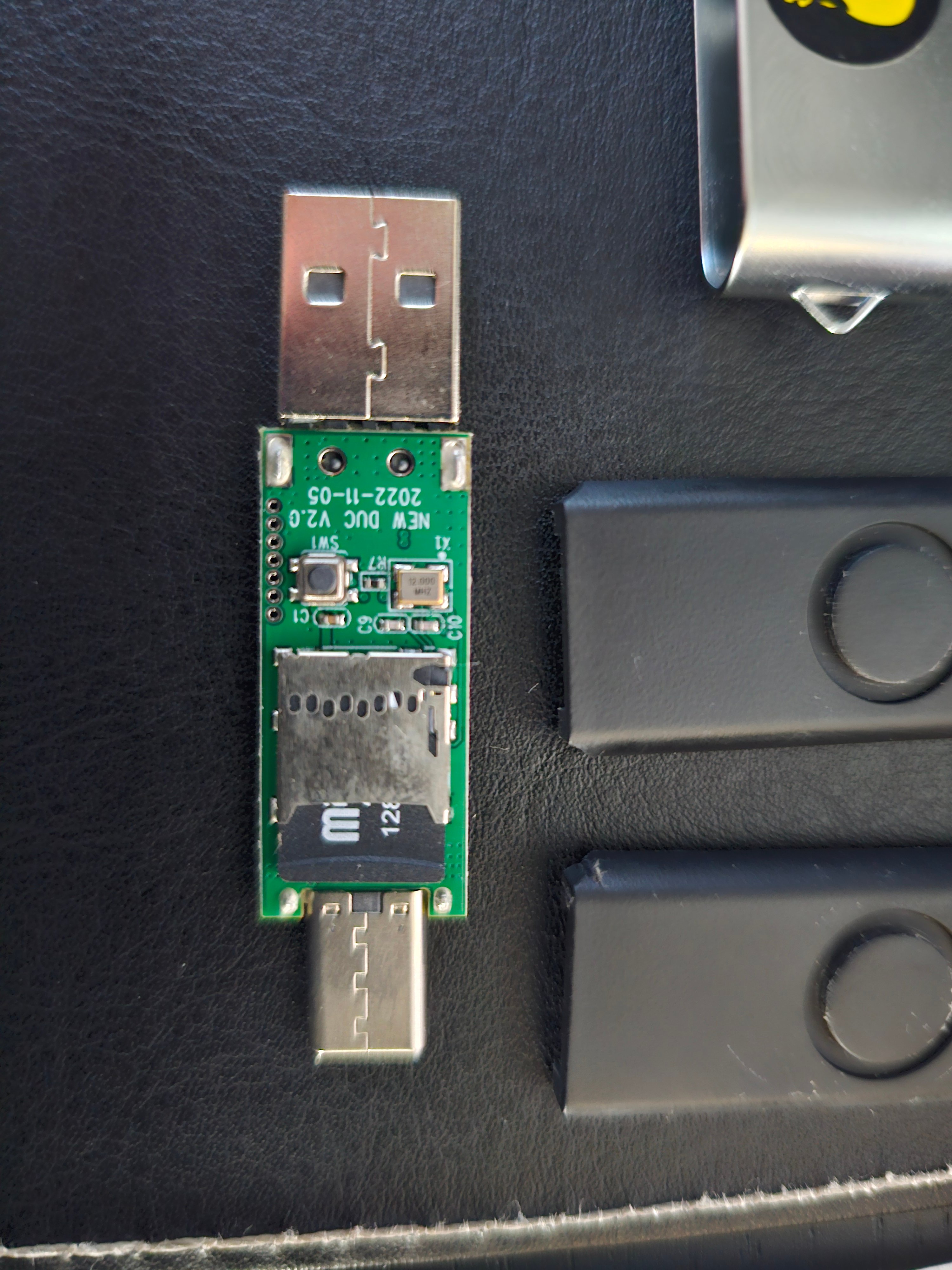 Close-up of the USB Rubber Ducky PCB showing the microSD card slot where payloads are stored