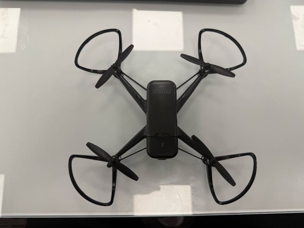 Top view of the black Pitsco Echo Drone with four propellers and prop guards