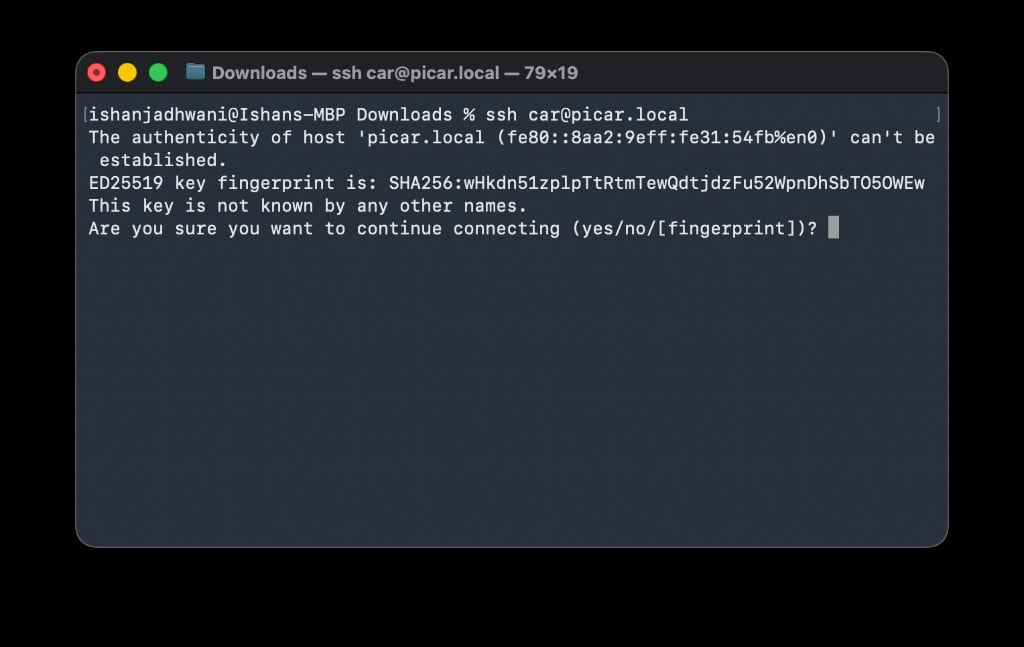 Terminal showing SSH fingerprint warning asking to continue connecting