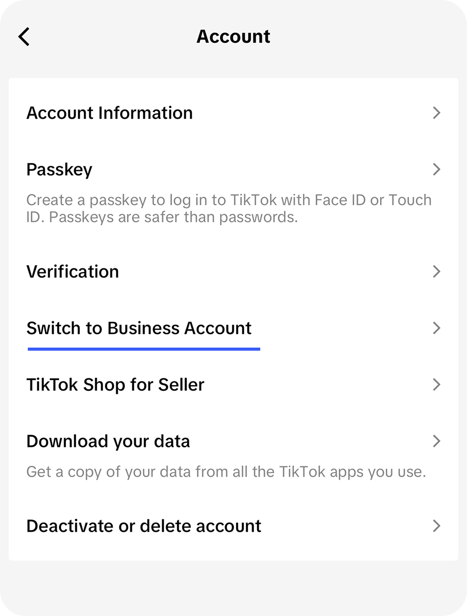 The Account settings screen in the TikTok app with the Switch to Business Account option highlighted
